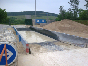 Decrotteur-de-roue-fixe-et-facilement-deplacable